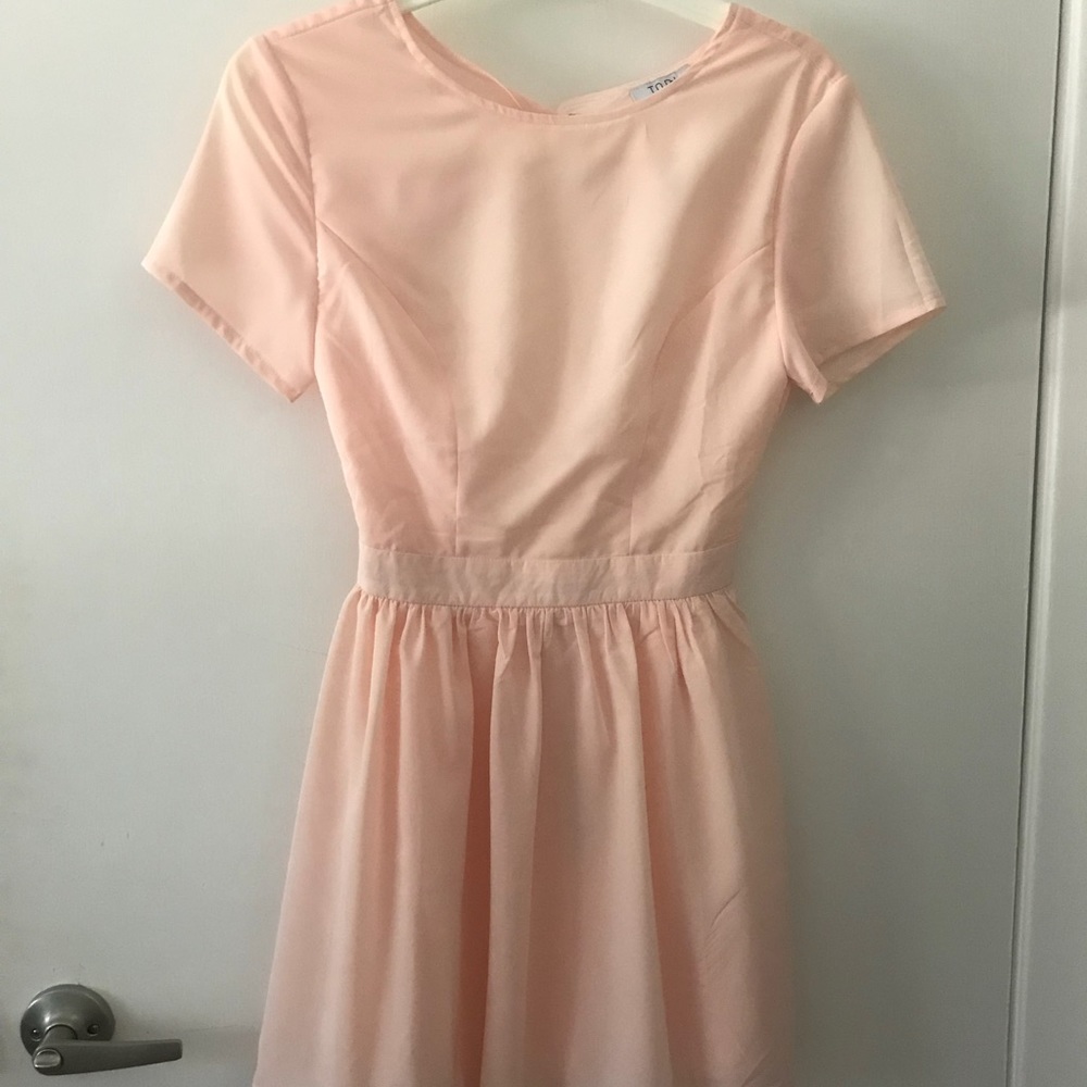 Pink mini dress with open back
